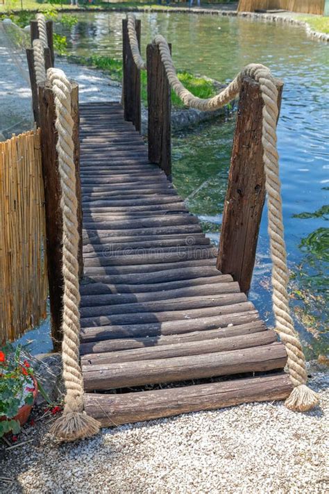 Log Bridge Pond stock photo. Image of wooden, nature - 242871396