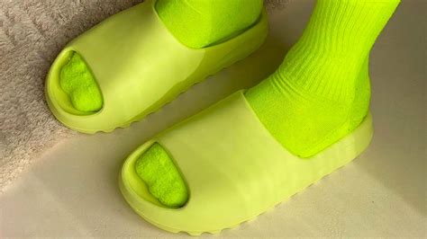 The Yeezy Slide "Glow Green" Is Getting a Major Restock! | The Sole ...