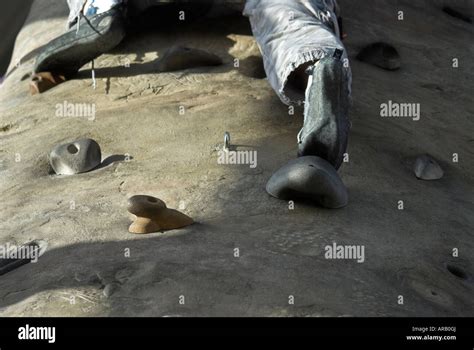 man on climbing wall at REI sporting goods store downtown Seattle ...