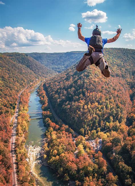 These daredevils parachute off a bridge— and you can watch! - Almost ...