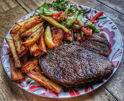 Sirloin steak homemade chips and pomegranate salad. Calories:764 Fat:26 ...