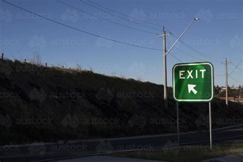 Image of Green exit road sign - Austockphoto