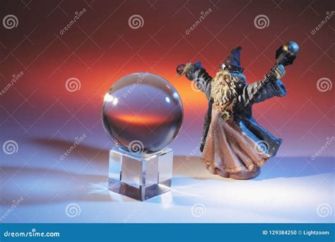 Wizard Figurine and Crystal Ball Stock Photo - Image of occult, fortune ...