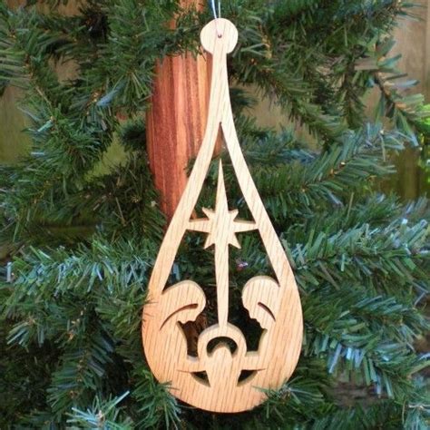 a wooden ornament hanging from a christmas tree