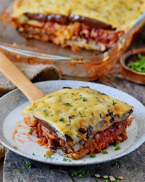 vegan-moussaka-on-a-plate-with-a-wooden-spatula - Best of Vegan