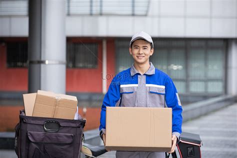 Courier Holding Carton Packing Box Picture And HD Photos | Free ...