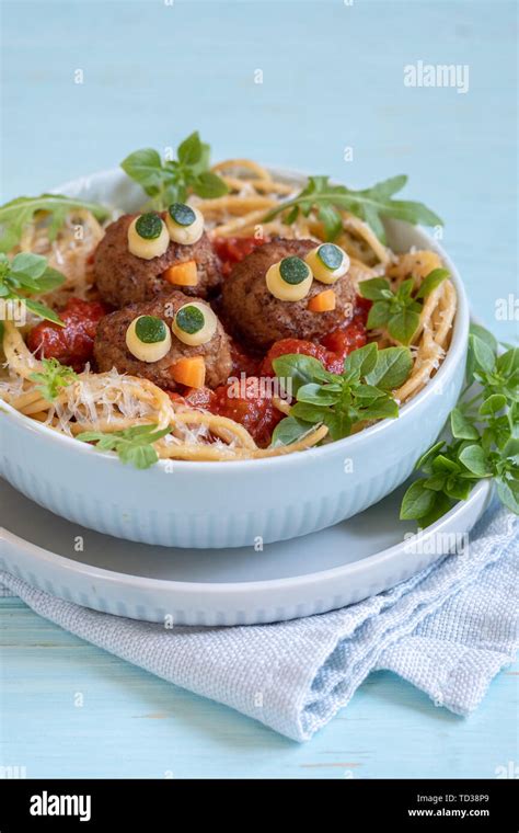 Pasta spaghetti with funny meatballs for kids. Birds in nests Stock ...