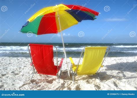 Beach Chairs And Umbrella In Sand Royalty Free Stock Photo - Image: 2598475