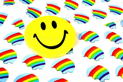 A smiley face on rainbow stickers. 5748382 Stock Photo at Vecteezy