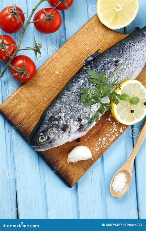 Fresh Raw Fish and Food Ingredients on Table Stock Image - Image of ...