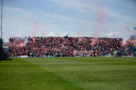 Gillingham and Rotherham United fans clash on the pitch at Priestfield ...