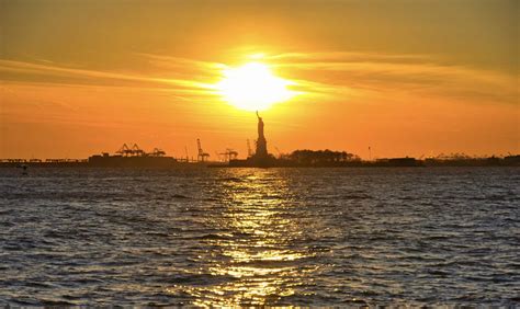 Statue Of Liberty At Sunset