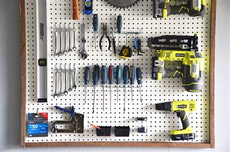 Woman in Real Life: Garage Organization - DIY Pegboard Tool Organizer ...