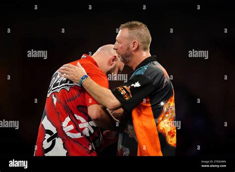 Jamie Hughes reacts after winning his match against David Cameron (not ...