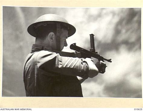 THE OWEN GUN CAN BE FIRED EITHER FROM THE SHOULDER OR HIP. | Australian ...