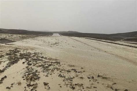 Death Valley turns muddy after flash floods : NPR