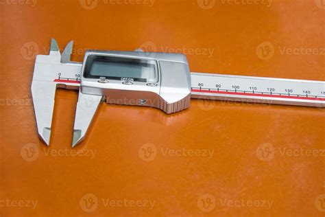 Vernier gauge on work site 21977720 Stock Photo at Vecteezy