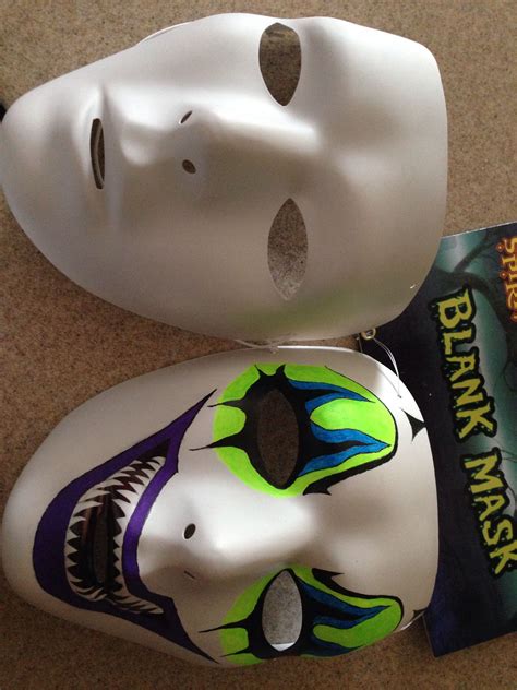 Not quite finished but before and after pic of hand painted blank mask ...