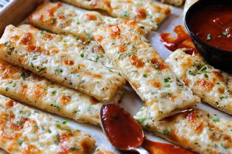 Cheesy Garlic Breadsticks easy from pizza dough! A Gouda Life