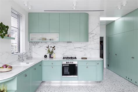 Mint Green Kitchen Cabinets Add A Colorful Element To This Home Addition