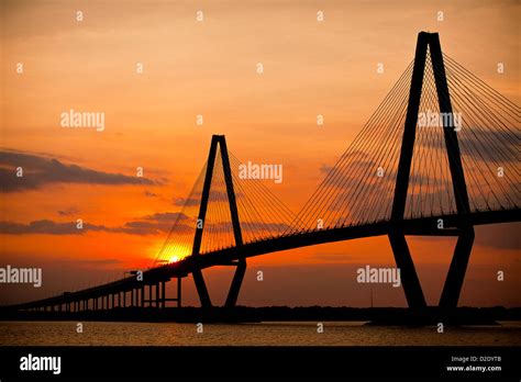 Sunset over the Arthur Ravenel Jr. bridge in Charleston, SC Stock Photo ...