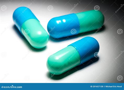 Blue and Green Time Release Capsule Pill Medication on White Stock ...