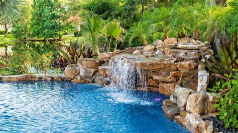 Pool waterfall ideas: 10 looks to elevate your swimming pool | Gardeningetc