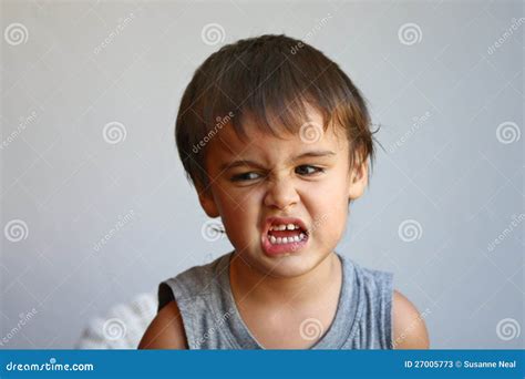 Cute Little Boy Makes Face Showing Eww Stock Photos - Image: 27005773