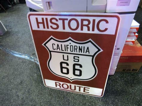 Historic California Route 66 metal highway road sign.