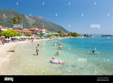 Tourists at Nidri Beach, Lefkada, Ionian Islands Greece Stock Photo - Alamy