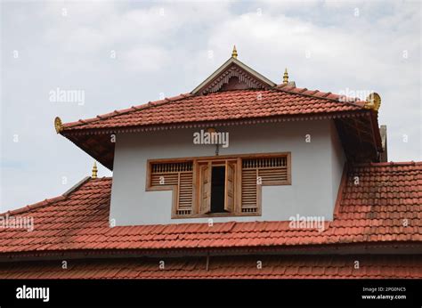 Traditional architecture of a tiled roof house in Kerala, using mainly ...