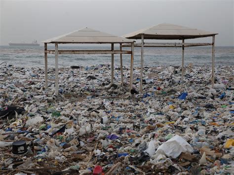 Lebanon: Huge piles of rubbish wash up on beach near Beirut amid ...