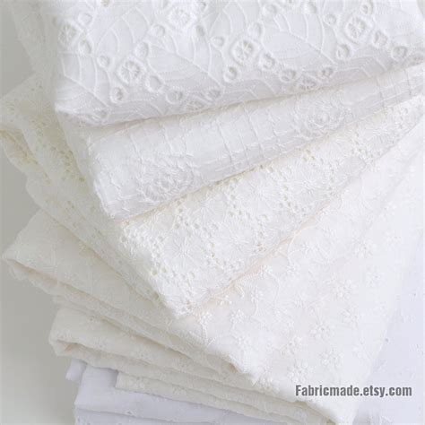 White Cotton Fabric With Embroidered Flower, Eyelet Embroidery Flower ...