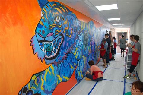 Circle Painting mural with the school's tiger mascot theme. Hosted my ...