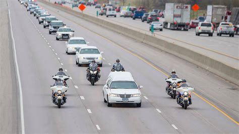 Photos: Scenes from Officer Susan Farrell's funeral proceedings