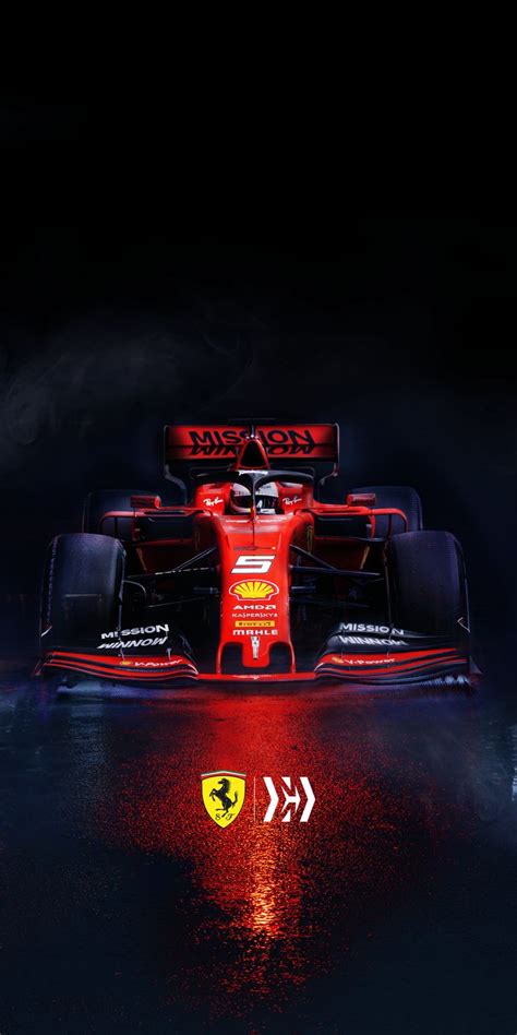 a red race car is shown in the dark