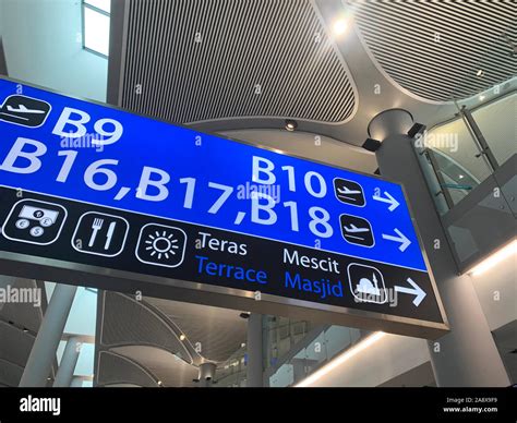 Close up view of gate info signage at new Istanbul airport Stock Photo ...