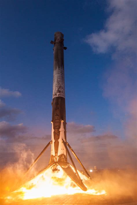 Stunning new SpaceX photos show a twice-used rocket landing on a ship ...