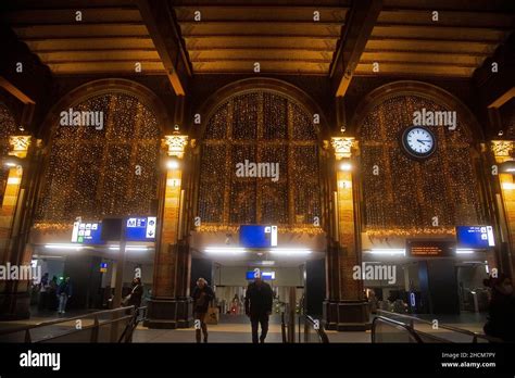 Features and architecture of Amsterdam Central Station in the evening ...