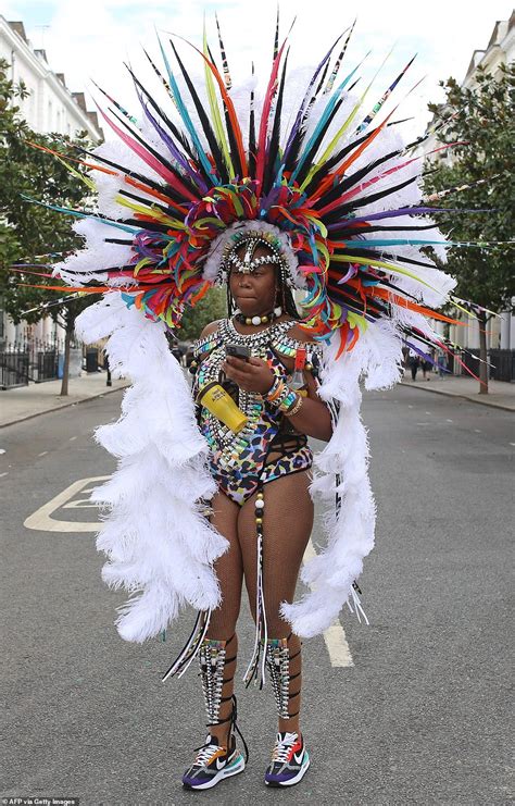 Notting Hill Carnival Day 2: Performers head out in flamboyant outfits ...