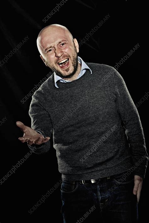 Smiling man holding hand out - Stock Image - F007/0730 - Science Photo ...