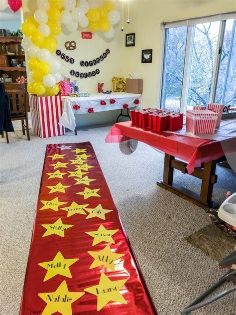 DIY Movie Theater Birthday Party with decorations like a red carpet ...