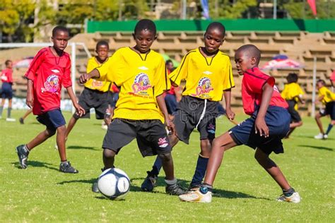 African Kids Playing Football