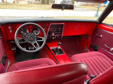 Descubrir 57+ imagen camaro red interior - Abzlocal.mx