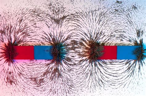 Iron filings on the magnetic field on a magnet. Magnetic force field ...