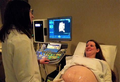 Pregnant woman having ultrasound at Madison OBGYN clinic - Madison ...