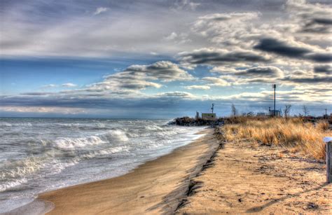 Shoreline and clouds at Illinois Beach State Park, Illinois image ...