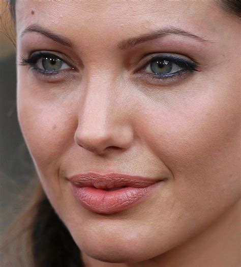 grey/dark blue eye pencil | Angelina jolie lips, Angelina jolie makeup ...