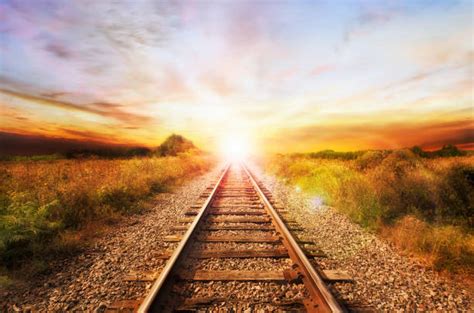 Train Tracks Sunset Stock Photos, Pictures & Royalty-Free Images - iStock