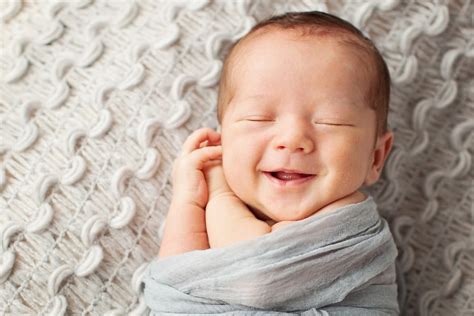 Smiling, Sleeping Newborn - Miette Photography